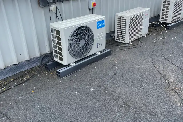 Outdoor air conditioning units on a commercial flat roof