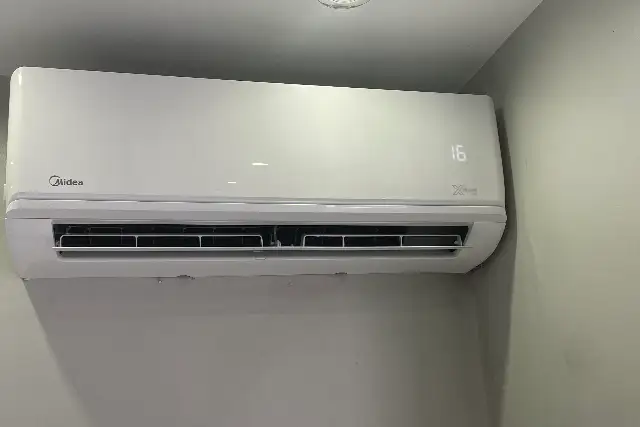Clean, freshly serviced wall-mounted air conditioning unit